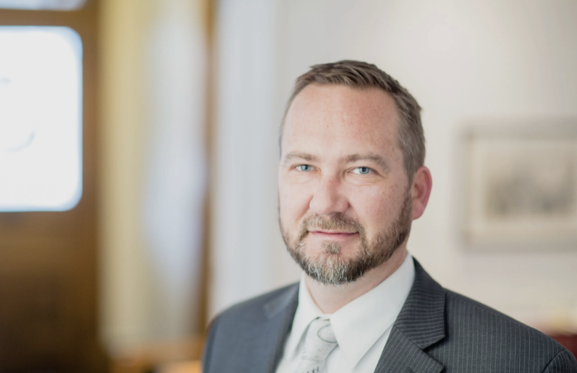 Editorial portrait of Josh Knight, principal attorney of Knight Law, photographed in cool natural light